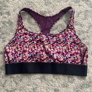 Victoria’s Secret VSX black purple orange sports bra